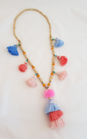 Long necklace in pearl and coral stones and beads